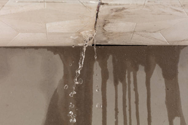 Professional Burst Pipe Cleanup technician working in Giddings, TX